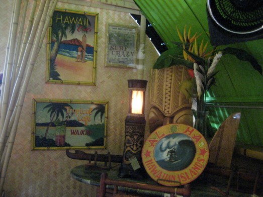 Retro Hawaii posters and tiki lamp